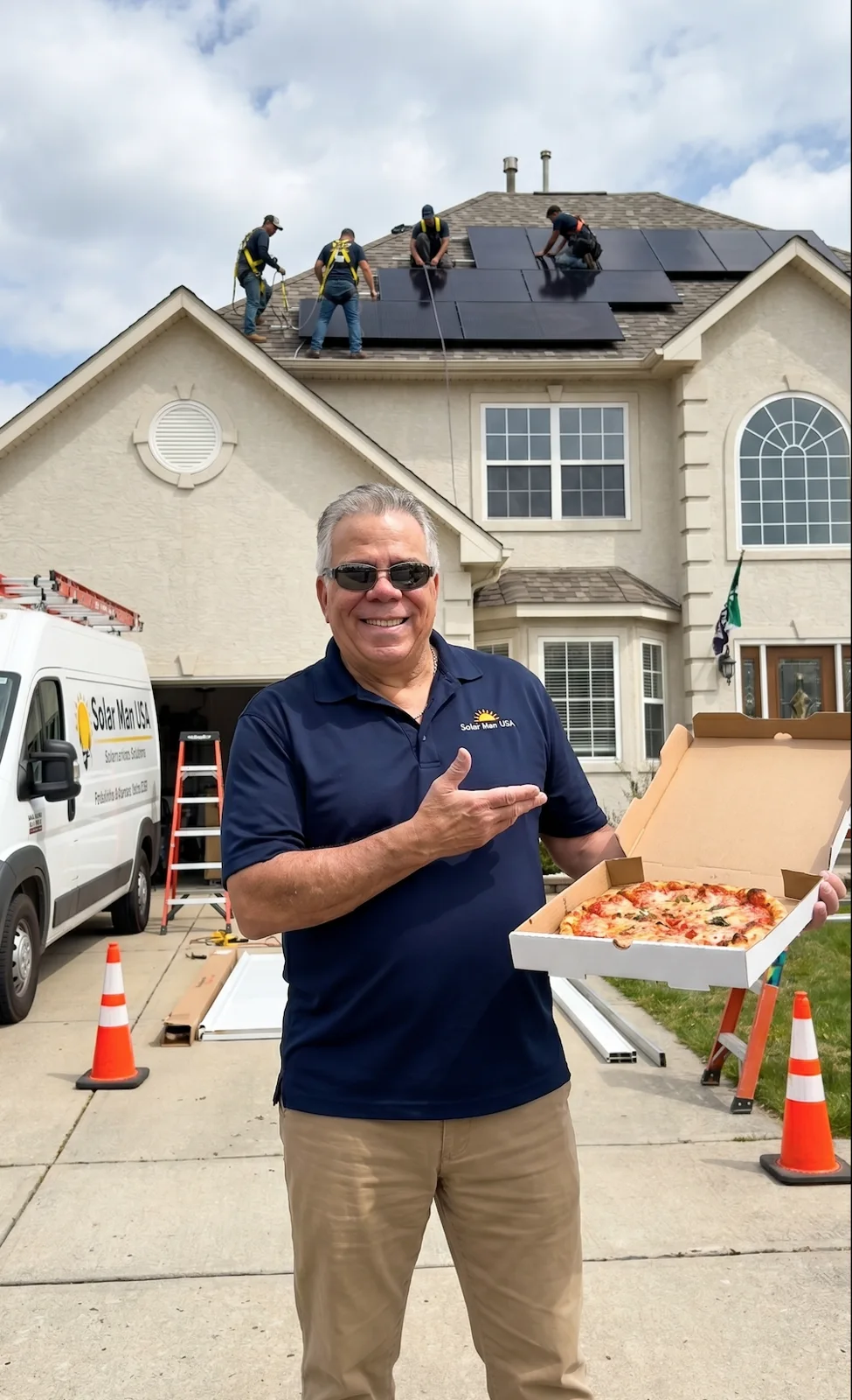 Ron sharing homemade pizza on installation day
